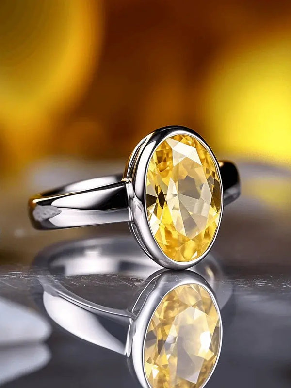 Oval Golden Yellow Sapphire Ring - Jupiter's Elegance | Brahmatells by Brahmatells
