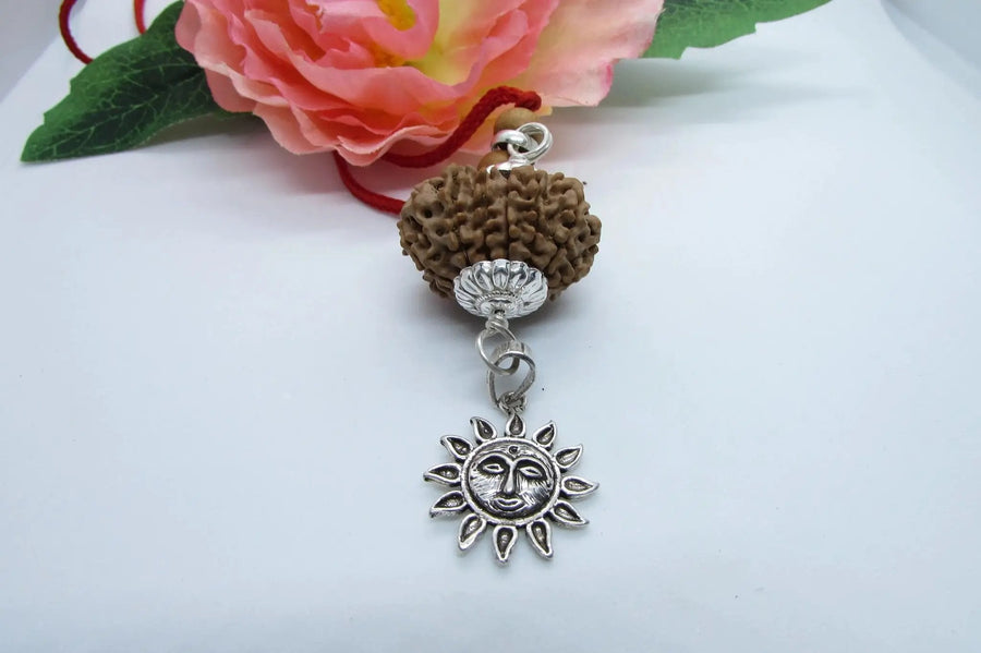 12 Mukhi Rudraksha Pendant with Surya Symbol in Silver - Spiritual Jewelry for Leadership & Clarity by Brahmatells