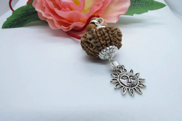 12 Mukhi Rudraksha Pendant with Surya Symbol in Silver - Spiritual Jewelry for Leadership & Clarity by Brahmatells