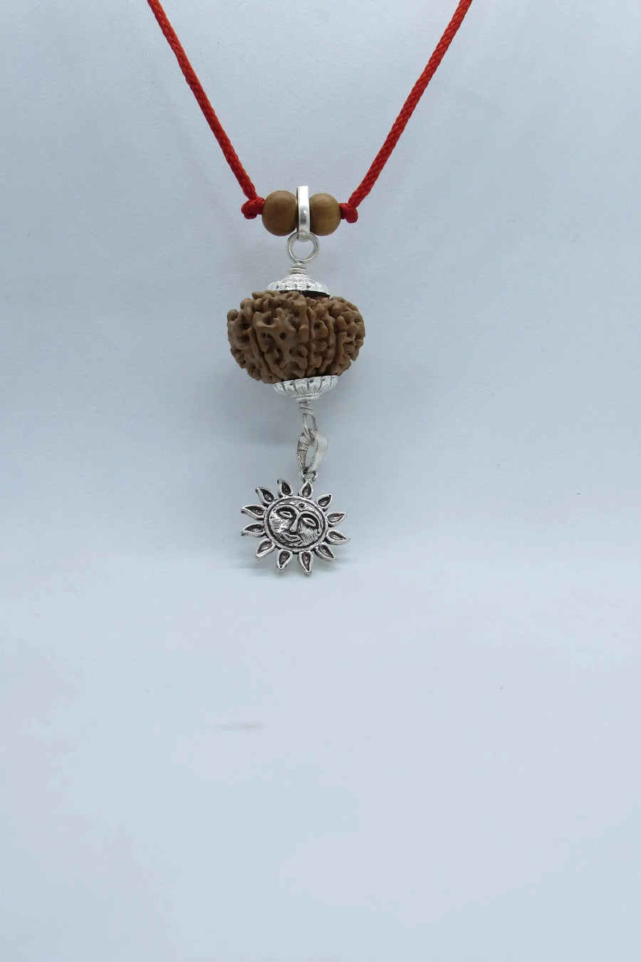 12 Mukhi Rudraksha Pendant with Surya Symbol in Silver - Spiritual Jewelry for Leadership & Clarity by Brahmatells
