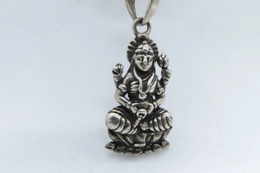 7 Mukhi Rudraksha & Laxmi Pendant in Silver | Brahmatells by Brahmatells