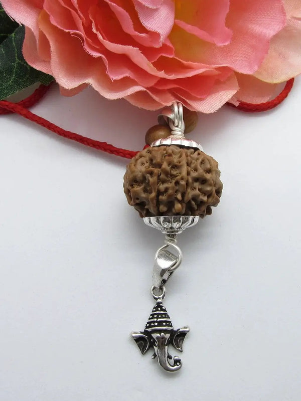 8 Mukhi Ganesha Rudraksha Pendant in Silver by Brahmatells by Brahmatells