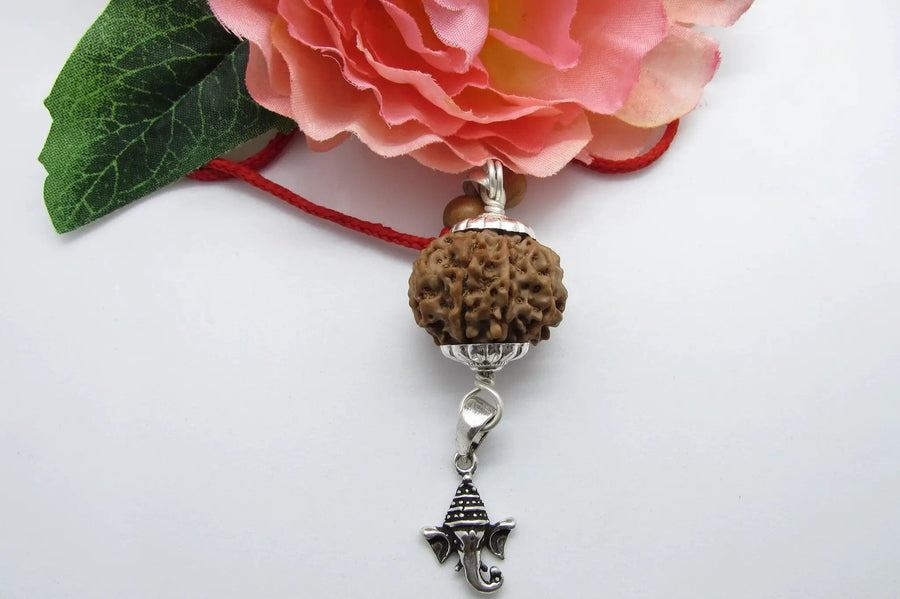 8 Mukhi Ganesha Rudraksha Pendant in Silver by Brahmatells by Brahmatells