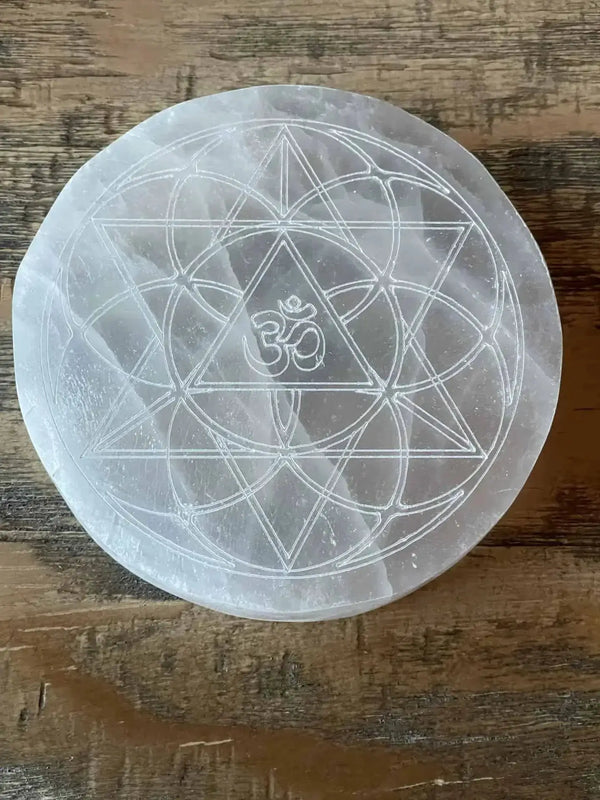 Selenite Charging Plate with the sacred Om symbol and the Flower of Life pattern by Brahmatells