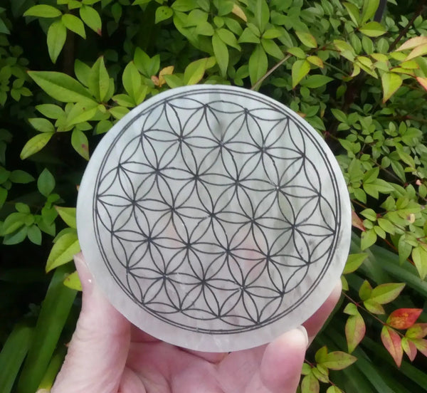 Selenite Charging Plate with the sacred Om symbol and the Flower of Life pattern by Brahmatells