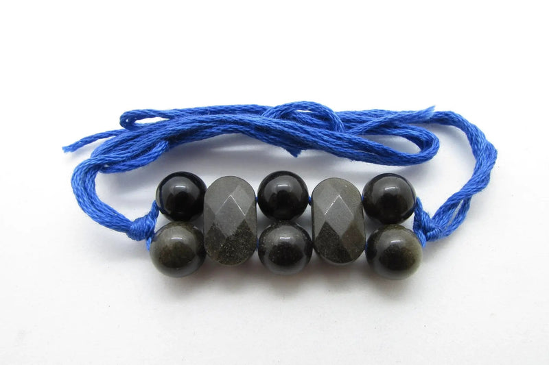 Black Obsidian Rakhi by Brahmatells