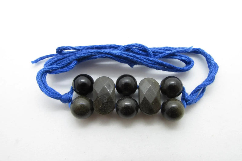 Black Obsidian Rakhi by Brahmatells