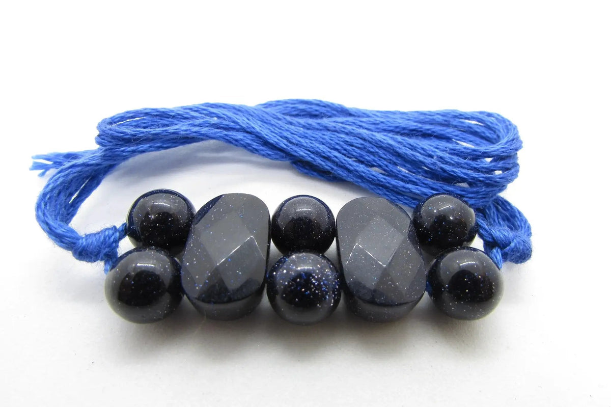 Blue Gold Stone Rakhi by Brahmatells