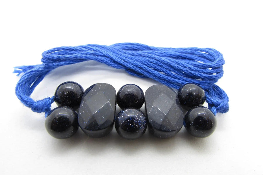 Blue Gold Stone Rakhi by Brahmatells