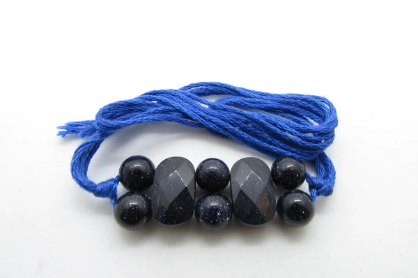 Blue Gold Stone Rakhi by Brahmatells