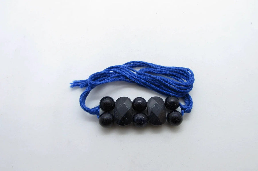 Blue Gold Stone Rakhi by Brahmatells