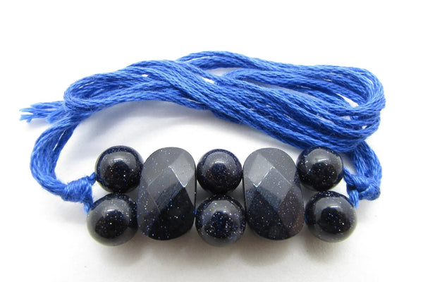 Blue Gold Stone Rakhi by Brahmatells