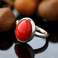 Brahmatells Red Coral Oval-Apple-Red Ring in Golden Setting: Mars-Infused Gem for Empowerment by Brahmatells