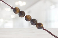 Empower Your Focus: Tiger's Eye Band | Brahmatells by Brahmatells