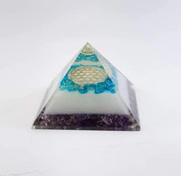 Energy Generator Blue Onxy Aqua Crystal And Amethyst Stone With Flower Of Life Logo Colorful Pyramid by Brahmatells