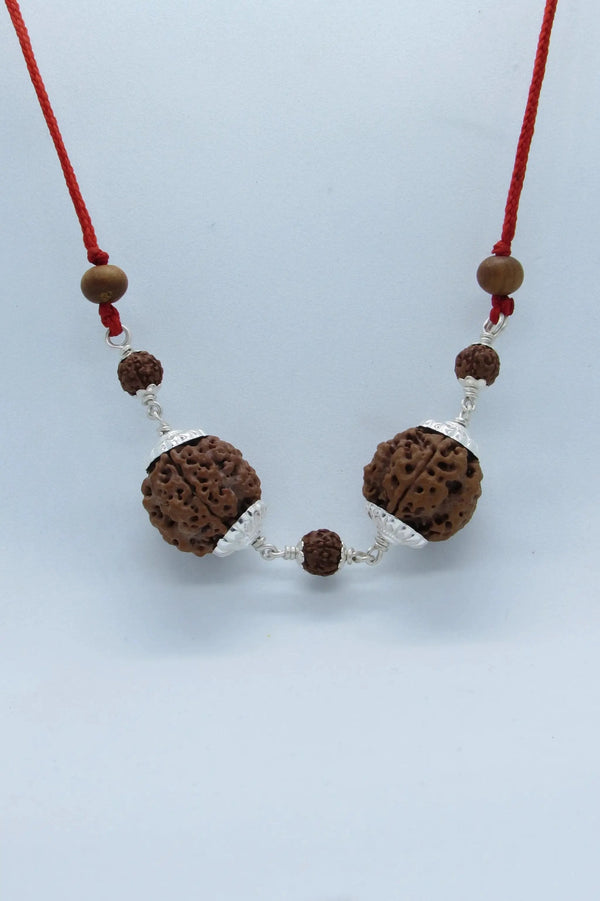 Gemini Zodiac 4 Mukhi Rudraksha Pendant with Dual Nepal Beads in Silver by Brahmatells by Brahmatells