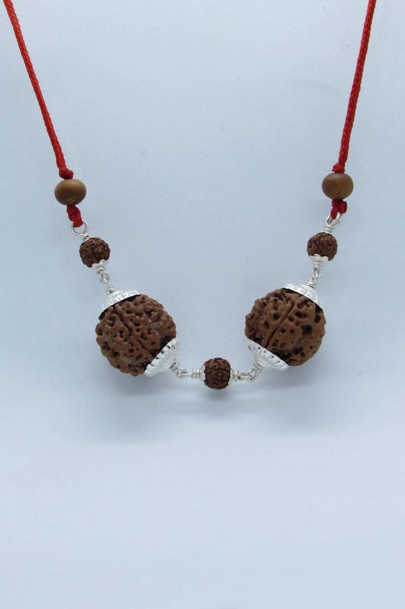 Gemini Zodiac 4 Mukhi Rudraksha Pendant with Dual Nepal Beads in Silver by Brahmatells by Brahmatells