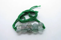 Flourite Rakhi by Brahmatells