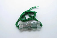 Flourite Rakhi by Brahmatells