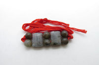 Labradorite Rakhi by Brahmatells