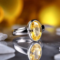 Oval Golden Yellow Sapphire Ring - Jupiter's Elegance | Brahmatells by Brahmatells