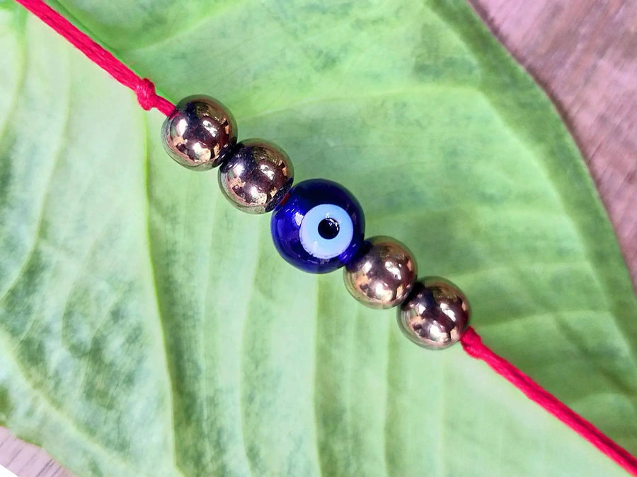 Pyrite with Evil Eye Protection | Money Magnet Crystal by Brahmatells