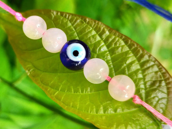 Rose Quartz With Evil Eye Protection by Brahmatells