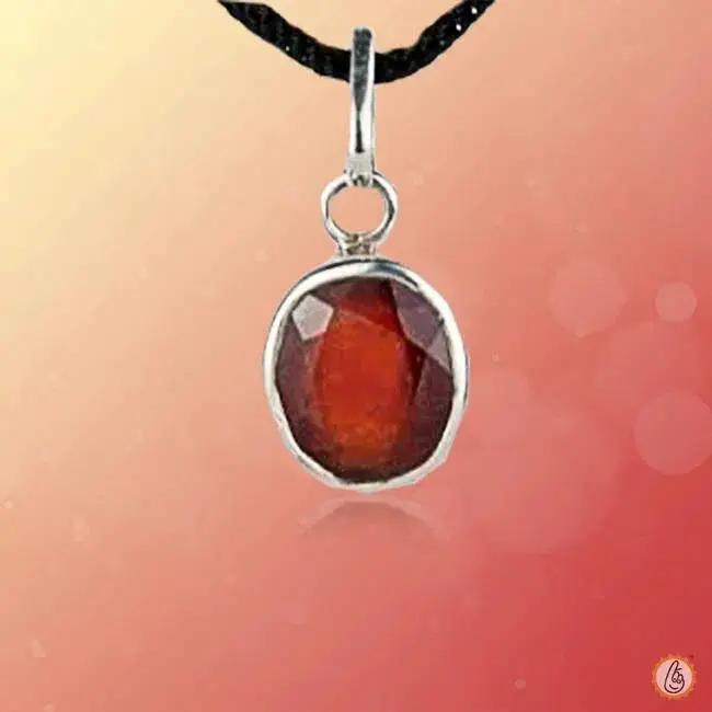 Saturn's Charm: Hessonite Gomed Round Silver Pendant | Brahmatells by Brahmatells