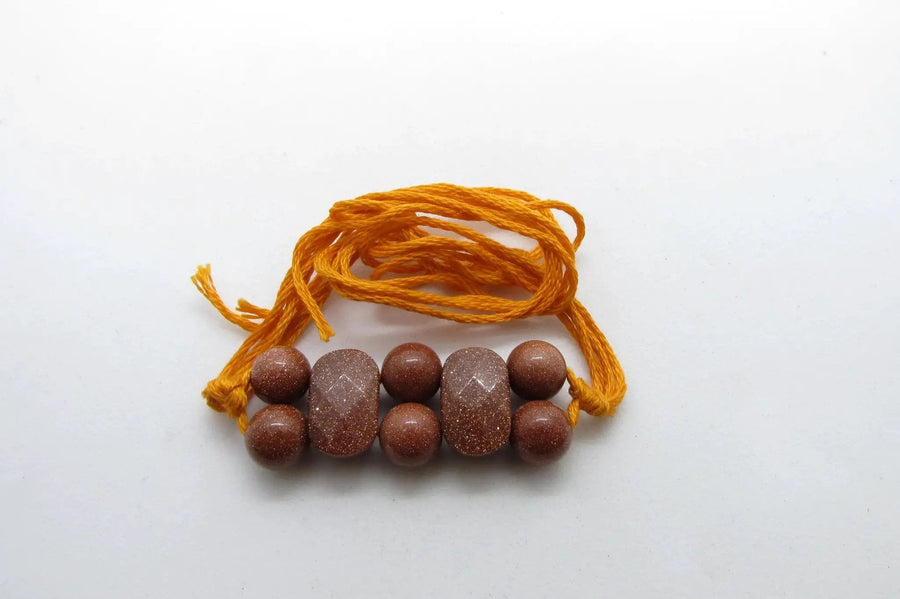 Sunstone Rakhi - Radiate Positivity and Luck by Brahmatells