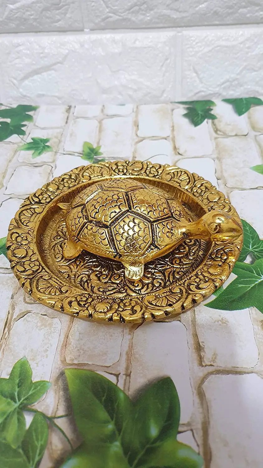 Tortoise On Plate (Golden) by Brahmatells