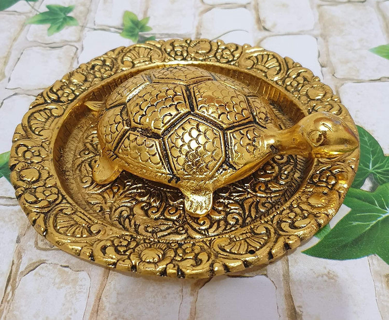 Tortoise On Plate (Golden) by Brahmatells