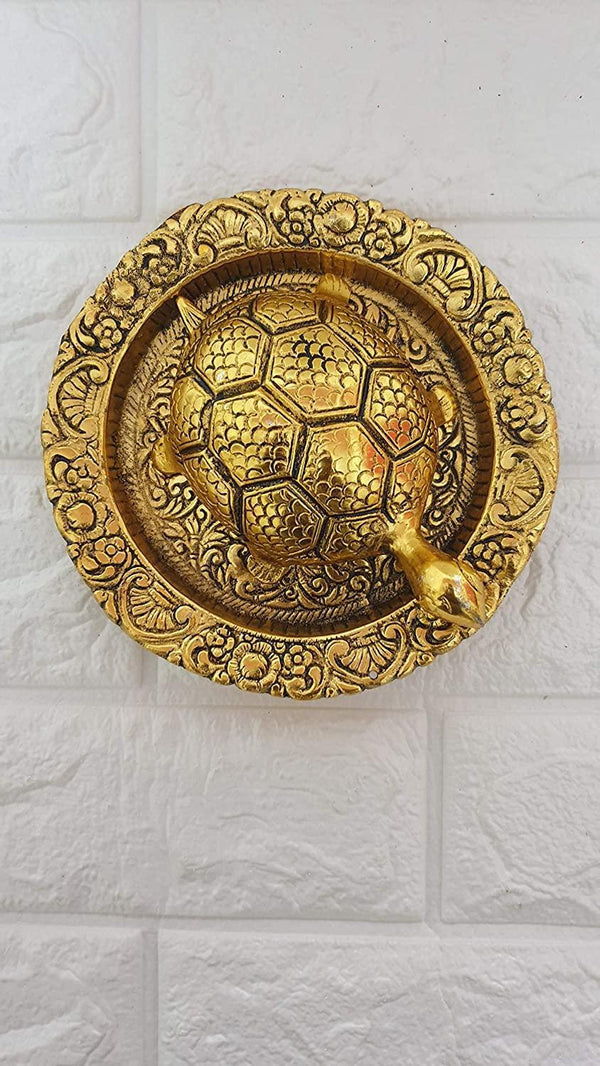 Tortoise On Plate (Golden) by Brahmatells
