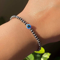 Ward Off Negativity with Evil Eye Black Crystals Bracelet | Brahmatells by Brahmatells
